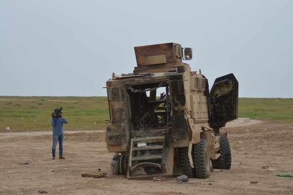 TV cameraman films battle-damaged Iraq Army vehicle near makhmur Sunday. 2 soldiers inside KIA 1 WIA 