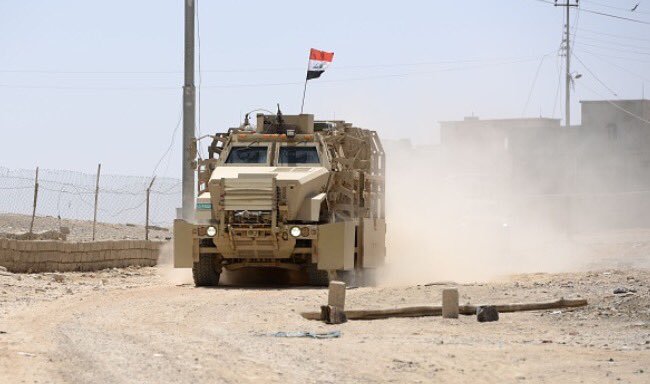 Retaking Qayyarah Air Base is being described as Iraq's largest armoured op since Saddam's forces invaded Kuwait