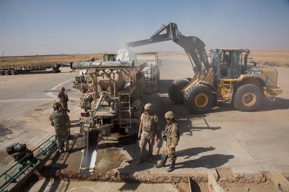 US soldiers working to rebuild the Qayyarah air base south of Mosul  