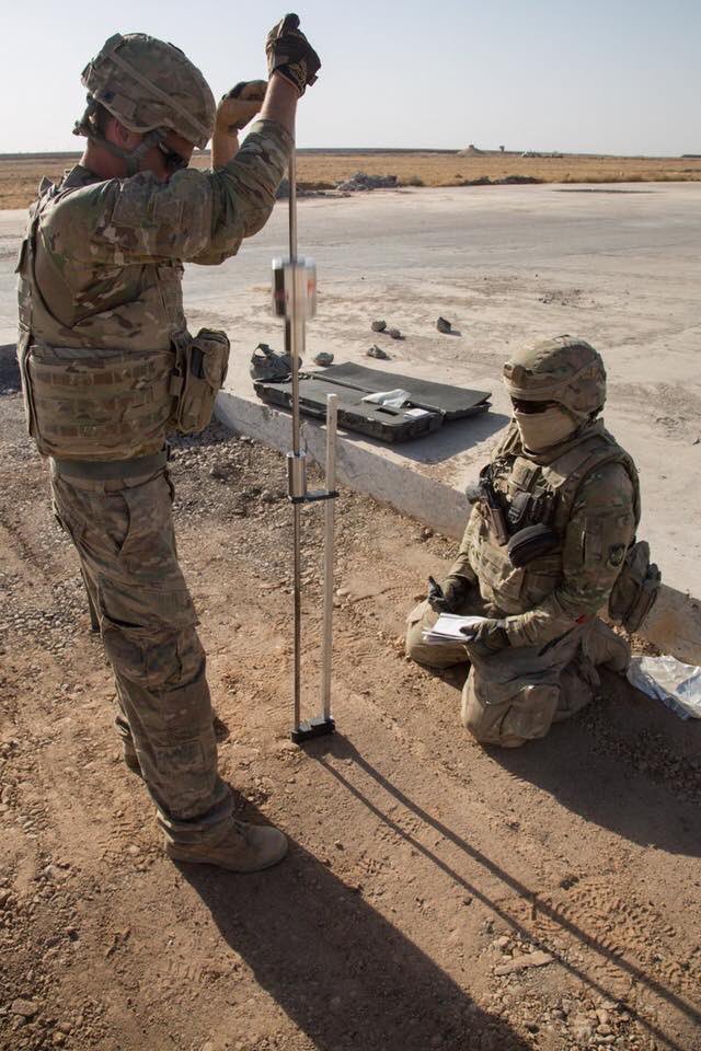 US soldiers working to rebuild the Qayyarah air base south of Mosul  