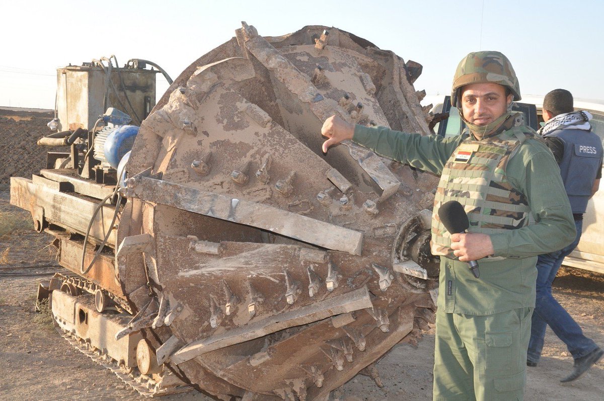 Daesh Tunnel Digger left by fleeing fighters is seized by units of Iraq Army 9th Armoured Division East of Mosul  