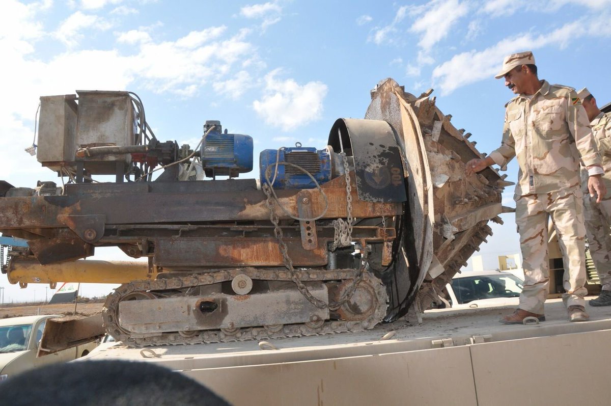 Daesh Tunnel Digger left by fleeing fighters is seized by units of Iraq Army 9th Armoured Division East of Mosul  