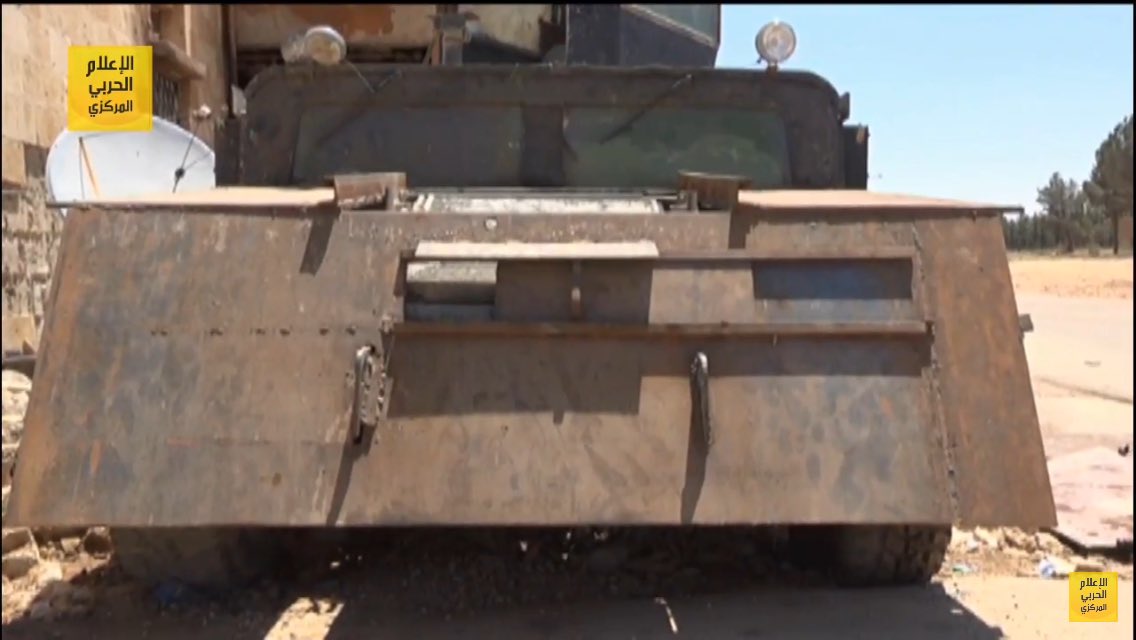 IS up-armored Mitsubishi 4x4 SVBIED  and  up-armored HMMWV captured by loyalists in push into Raqqah province  