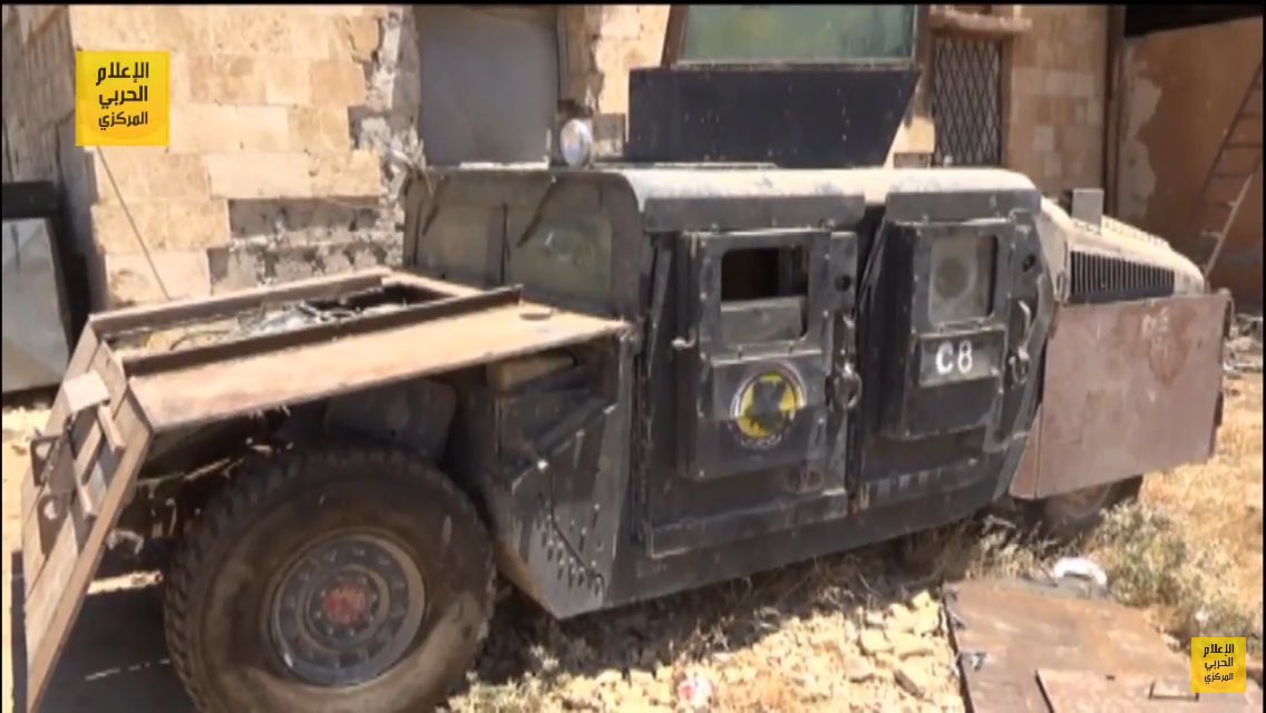 IS up-armored Mitsubishi 4x4 SVBIED  and  up-armored HMMWV captured by loyalists in push into Raqqah province  