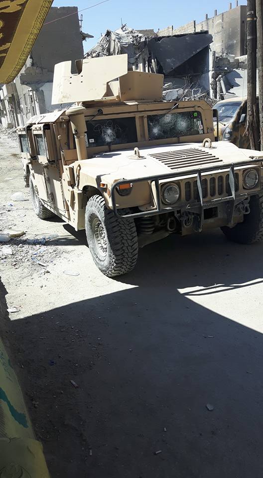 Pic of 1 of the Hummers that is used for transport of wounded SDF in Raqqa. Daesh snipers hit the windows many times   