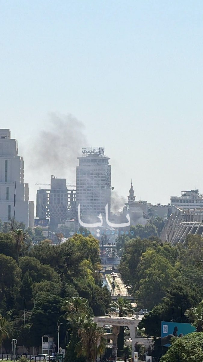 Initial reports of two explosions in Damascus near the hotel where French President Emmanuel Macron is staying